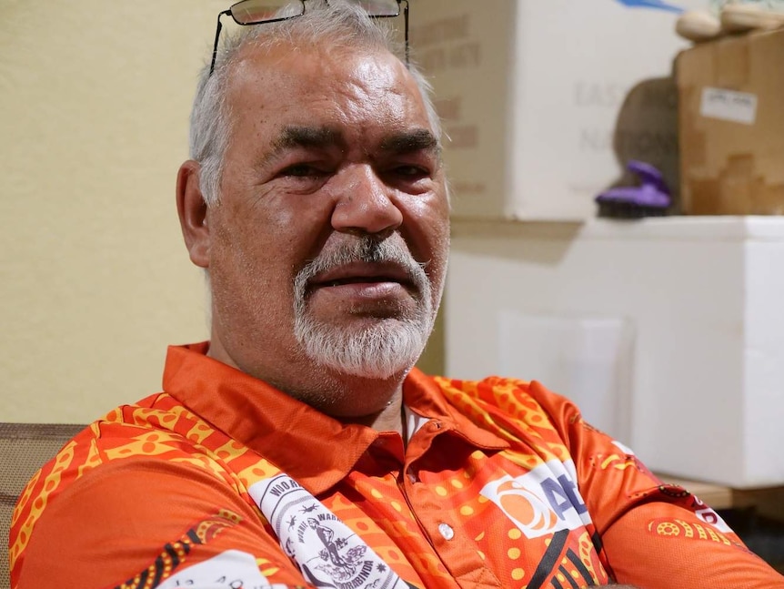 Close up of middle-aged man looking into camera