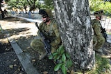 More than 2,700 Australian-led troops and police have been sent to the country to restore order.