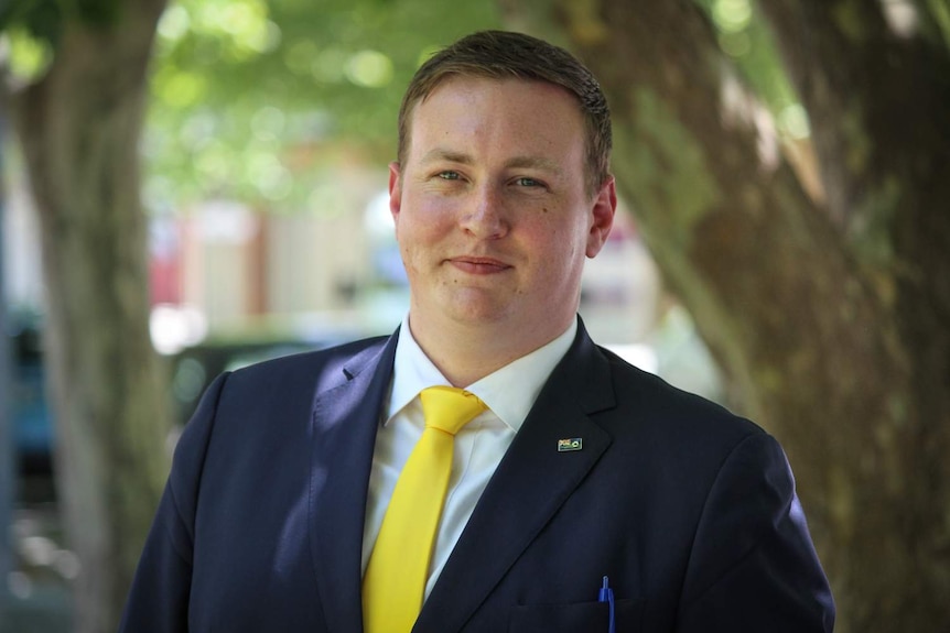 Headshot of politician in Perth street