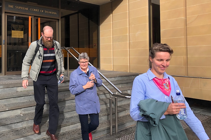 Rembertus and Fanny Beerepoot exit court building with their mother.