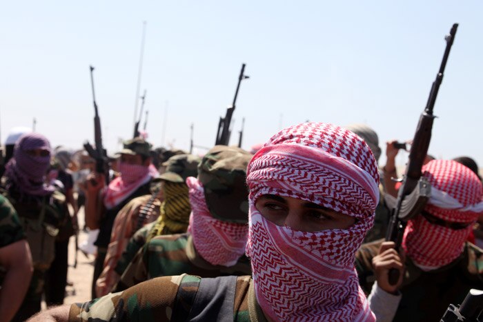 Sunni militiamen at an anti-government protest in Ramadi.