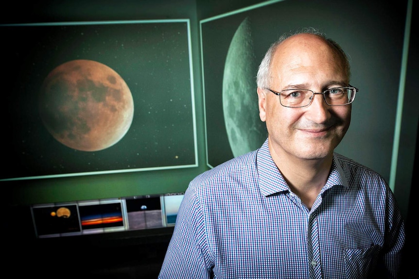 QUT astrophysicist Dr Stephen Hughes in his research lab