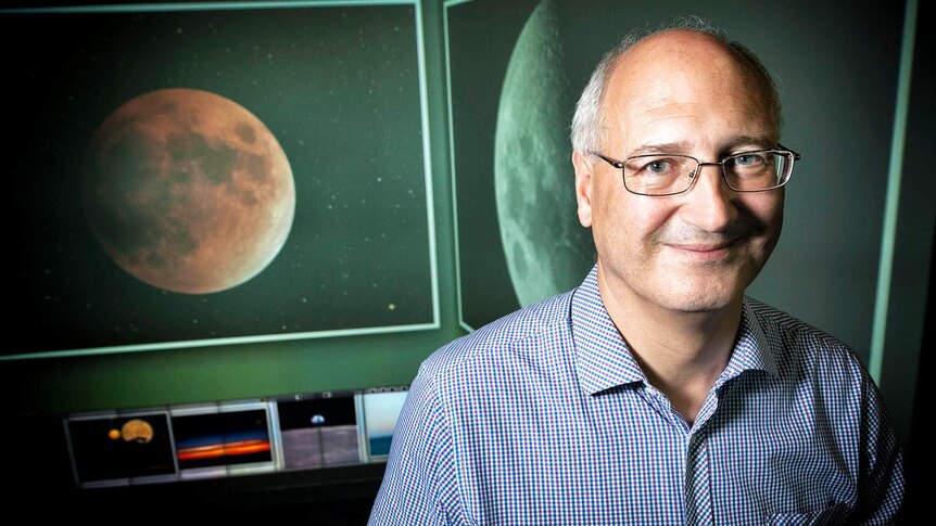 QUT astrophysicist Dr Stephen Hughes in his research lab