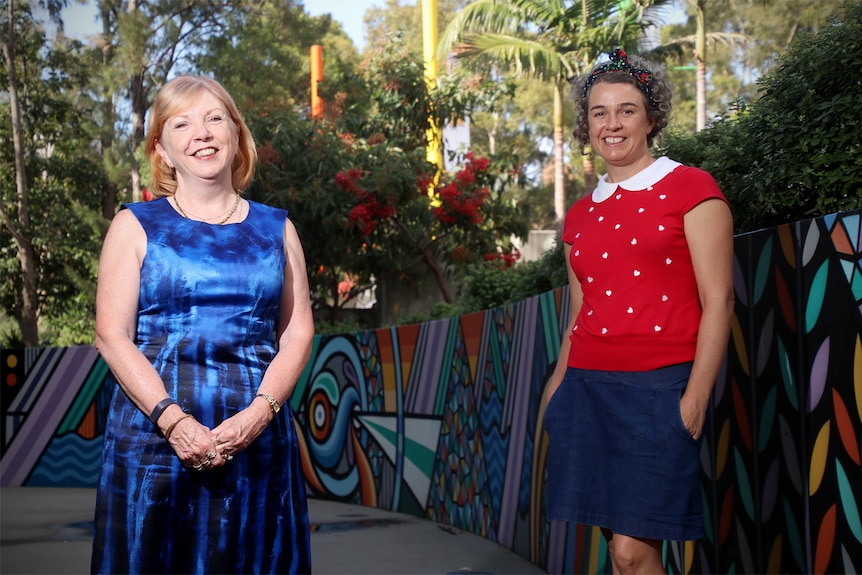 Noelene Weatherby-Fell and Dr Kimberley O'Brien stand outside the Early Start building at University of Wollongong.