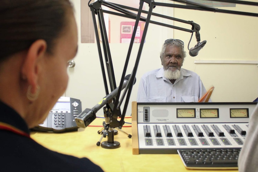 Kowanyama elder Colin Lawrence Snr sits in radio booth in his community Kowanyama.
