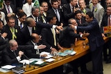 Brazilian MPs argue during President Dilma Roussef's impeachment session.