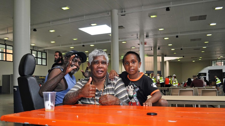 L-R: William Mathieson, Eric Blay and Livingtsone Chambers-Blair settle in at the RNA showgrounds evacuation centre.