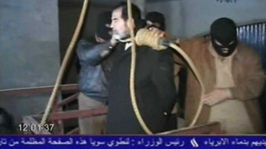Saddam Hussein being prepared for execution in Baghdad