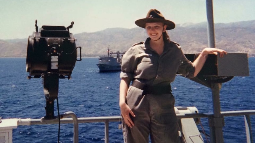 Sarah Miller stands on the flag deck of HMAS Tobruk during INTERFET operations in East Timor in 1999.