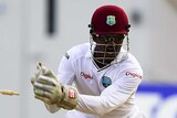 Leadership questioned ... West Indies captain Denesh Ramdin attempts to stump Steve Smith