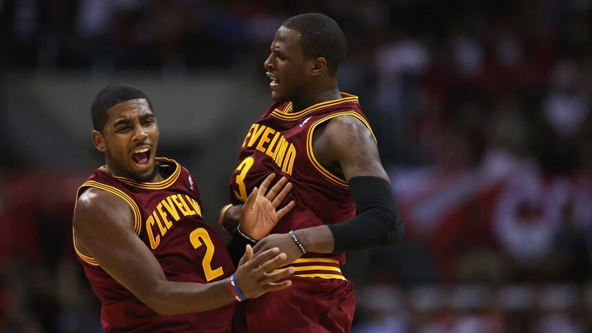 Kyrie Irving (#2) celebrates hitting a three-pointer for the Cleveland Cavaliers.