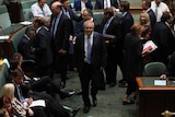Prime Minister Scott Morrison walked through the House of Representatives and his colleagues walk in another direction