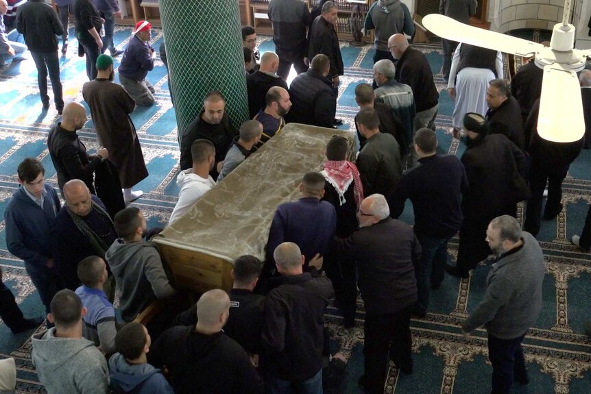 Family members carry the casket of killed Israeli exchange student Aiia Maasarwe into a mosque in Baka al Gharbiyye.