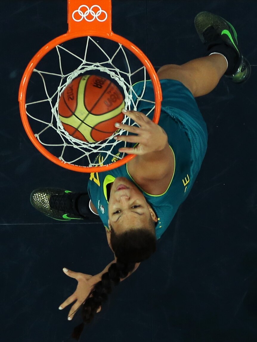 Australia's Liz Cambage dunks the Group B match against Russia