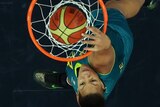 Australia's Liz Cambage dunks the Group B match against Russia