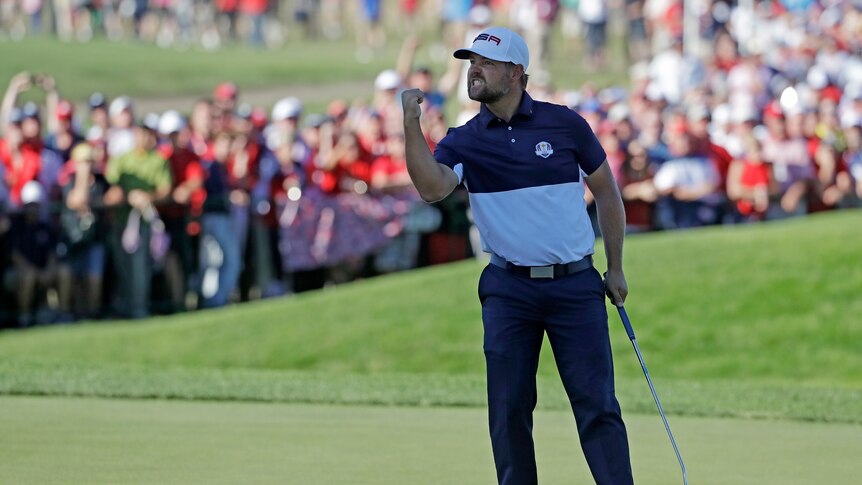 Ryan Moore celebrates winning the Ryder Cup