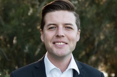 Young man smiling at camera