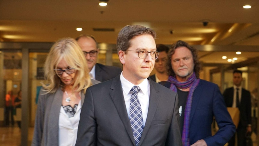 Thomas Zinn (centre) with Tori Johnson's parents.