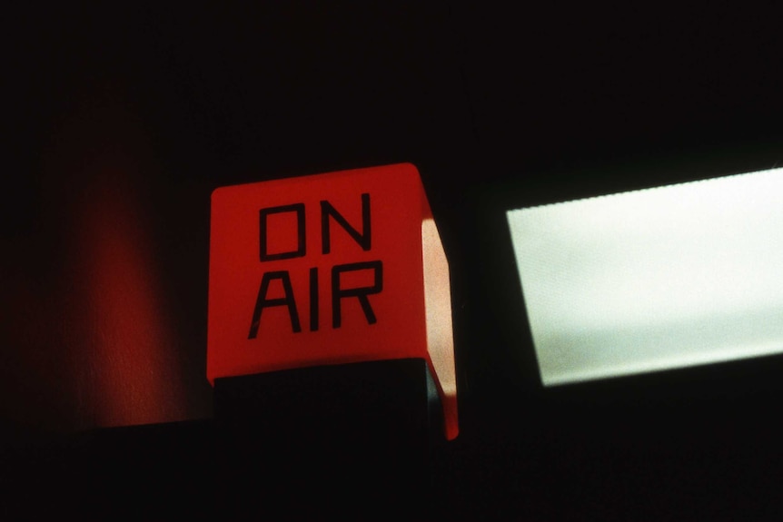 Studio light lit up as AM is broadcast from the ABC in Sydney.