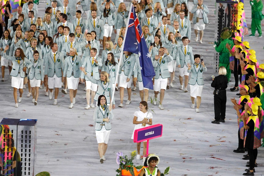 Anna Meares of Australia leads her contingent during the opening ceremony.