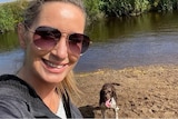 Nicola Bulley takes a selife with her dog Willow and a river in the background. 