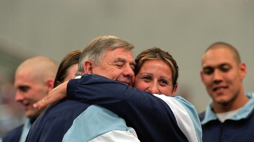 John Carew (l) and Hayley Lewis embrace during the 2000 Olympic Selection Trials