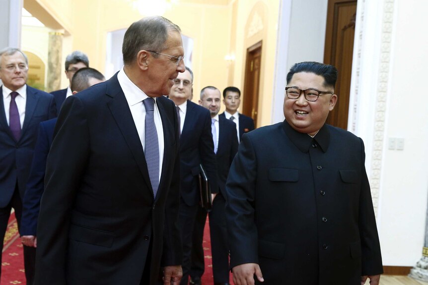 Sergey Lavov chats with Kim Jong-un