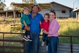 Ben and Karena Wilson with their two children at the sheep yards near Dirranbandi, April 2021.