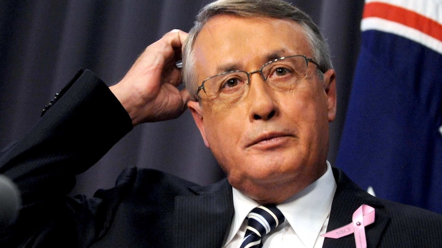 Federal Treasurer Wayne Swan explains the Mid-Year Economic and Fiscal Outlook on October 22, 2012