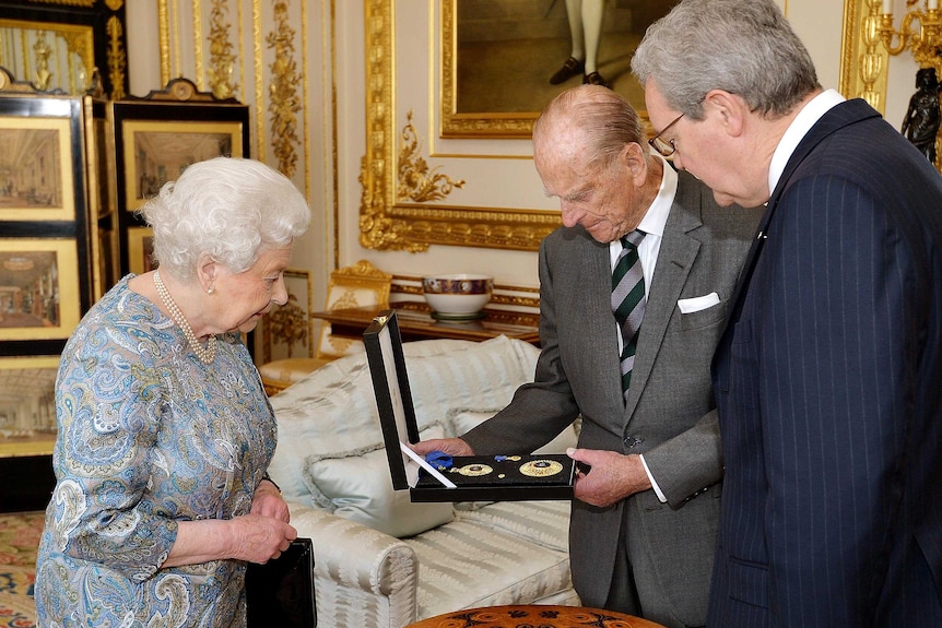 Prince Philip receives Insignia of a Knight of the Order
