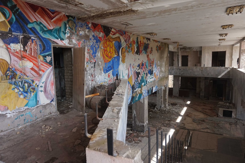 Socialist realist mural inside of cultural centre in Pripyat