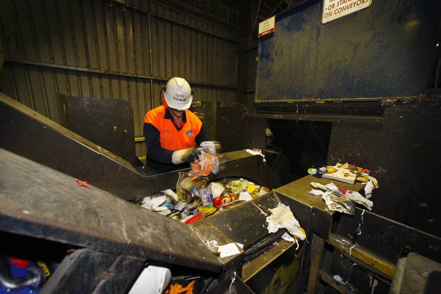 Workers at the Materials Recovery Facility, Hume, ACT.