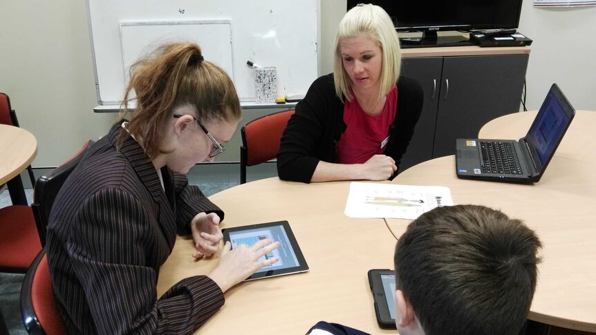 School guidance counsellor Rachael Proctor shows students how to use the Brave Online Program