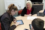 School guidance counsellor Rachael Proctor shows students how to use the Brave Online Program