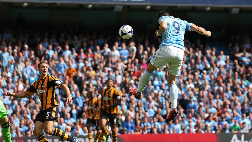 Alvaro Negredo heads home for the opening goal for Manchester City against Hull City.
