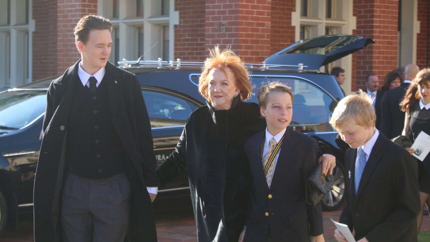 Former wife Eileen Bond arrives at the funeral