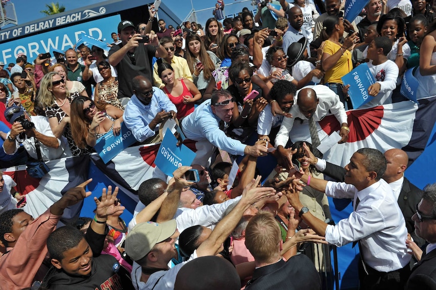 The Obama campaign had personal contact - a conversation in person or on the phone - with over 125.6 million people (AFP)