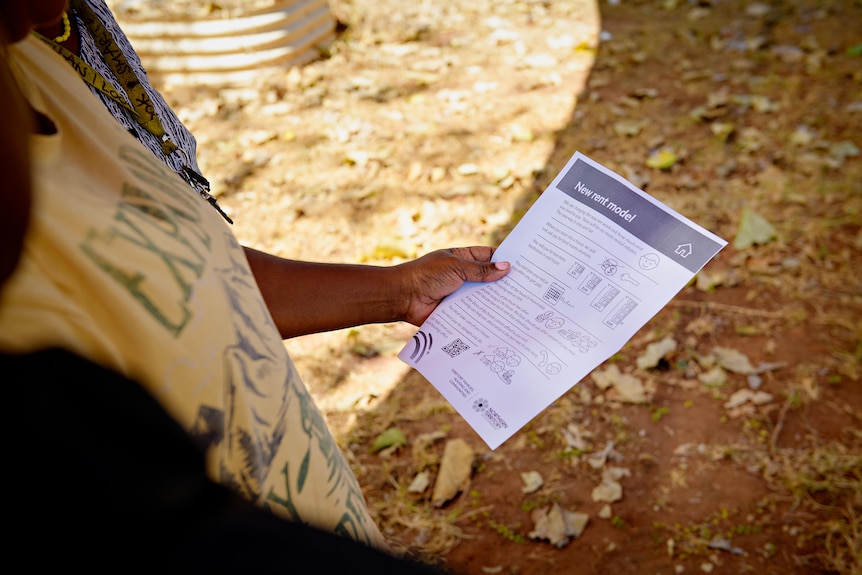 a person holding a government letter