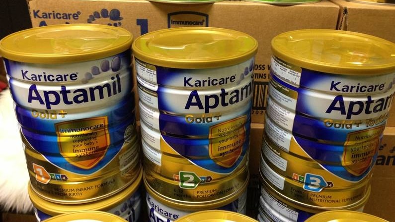 Tins of Karicare baby formula