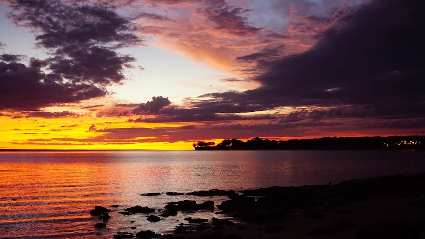 A sunset view north from Darwin. (Pixabay: Ann Owen)
