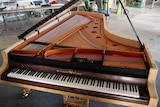 Stuart and Sons 108 key 9 octave piano from a high angle