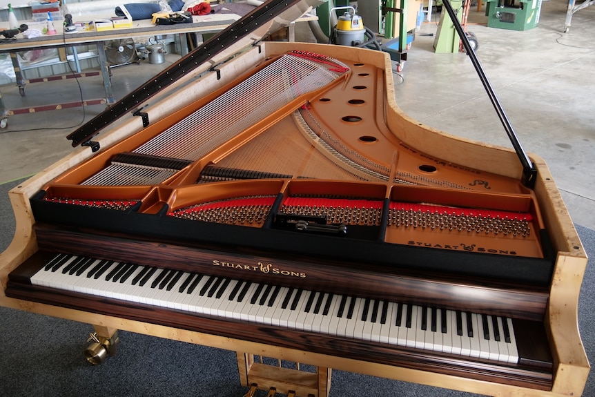 Stuart and Sons 108 key 9 octave piano from a high angle