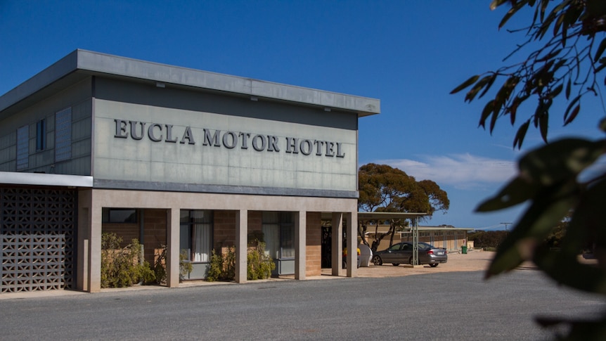 A building with a sign that reads 'Eucla Motor Hotel'