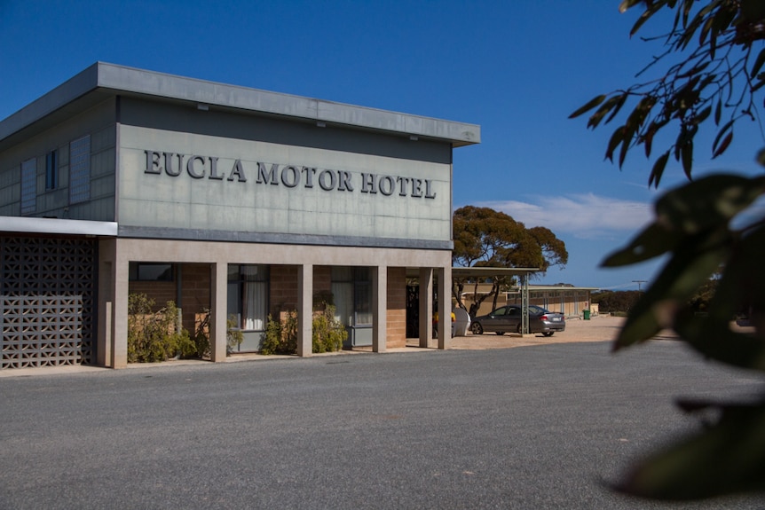 A building with a sign that reads 'Eucla Motor Hotel'