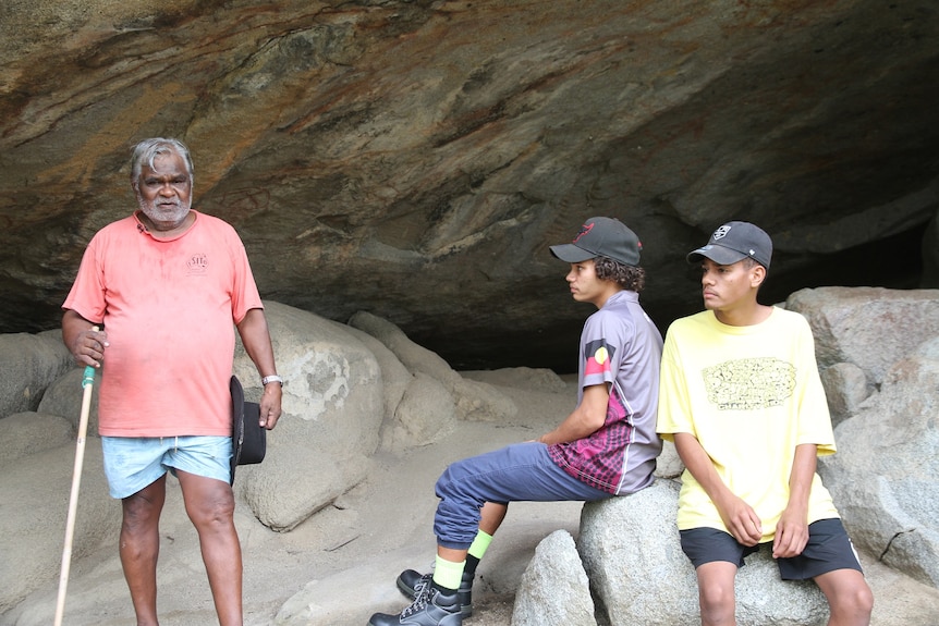 Indigenous elder Russell Butler with Justin Bonardio and Rhahmon Costello at Turtle Rock, a sacred site in North Queensland.