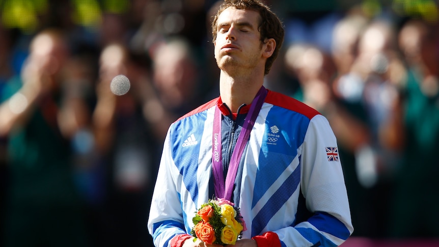 Andy Murray breaths a sigh of relief at gold medal ceremony