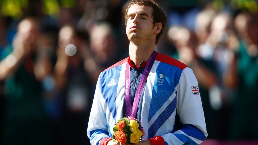 Andy Murray breaths a sigh of relief at gold medal ceremony