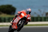 Casey Stoner lifts the front wheel