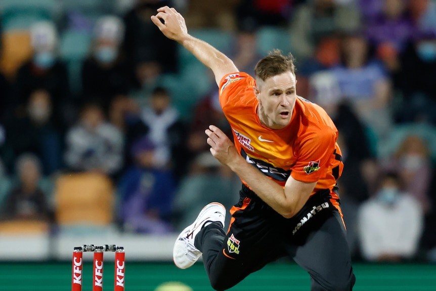 A close-up shot of Jason Behrendorff bowling for the Perth Scorchers.