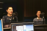 Nas Campanella (L) and Bec Wong (R) sit in the triple j newsroom for an interview